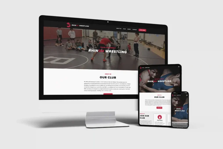 Rhinoh Wrestling Club website mockup on multiple devices.